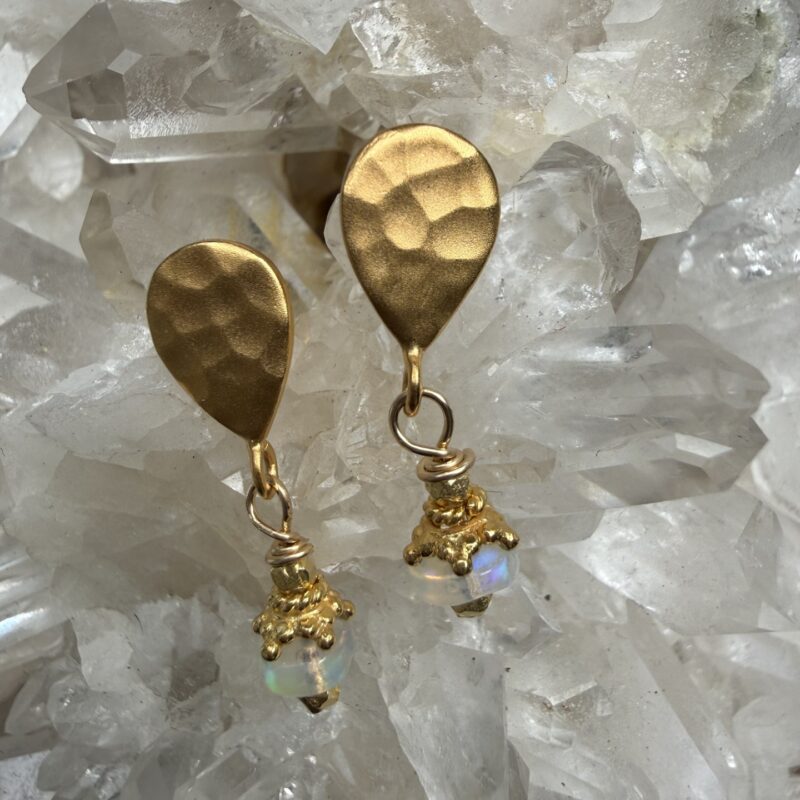 Opals with gold details on hammered gold tops