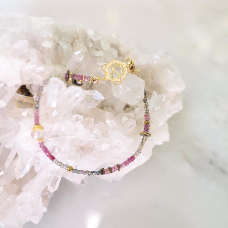 Pink sapphires with green and multicolored sapphires, gold, and hematite details, 7.5"